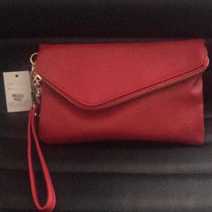 Dual-compartment wristlet with flap over design